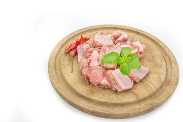 raw pork ribs on cutting board