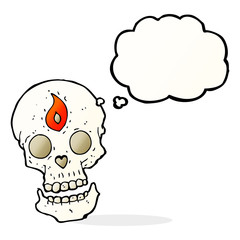 cartoon mystic skull with thought bubble