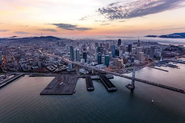 Poster Aerial of San Francisco at sunset © muddymari