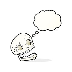 cartoon spooky skull with thought bubble