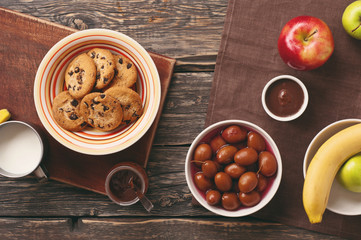 cookies with chocolate, milk and fruit