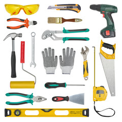 Set of construction tools isolated on a white background. Level, saw, glasses, tape measure,...