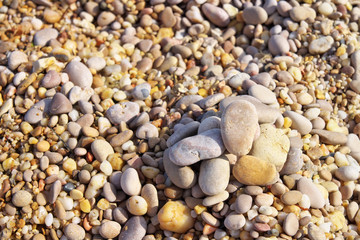 Colourful stones, pebbles on the beach.
