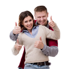 smiling couple with thumbs up