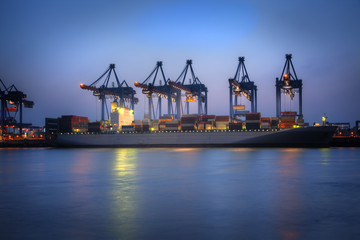 Photo of Container Ships in the harbor of Hamburg, Germany. HDR.