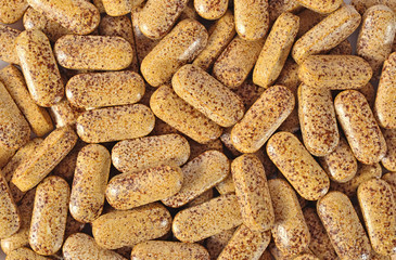 Top view of pills as background