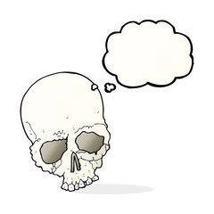cartoon spooky old skull with thought bubble