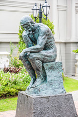 Sad man sculpture in European style