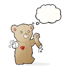 cartoon teddy bear with torn arm with thought bubble