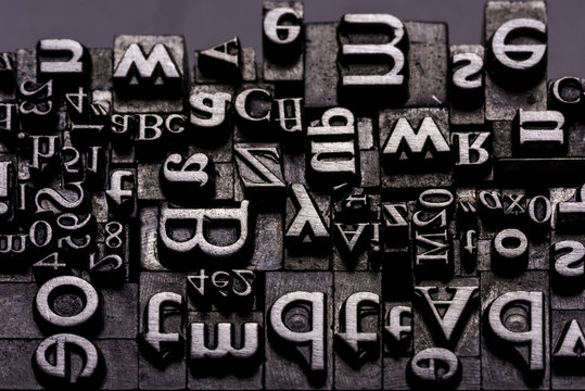 Typographical.
Different metal characters, it used to print documents
