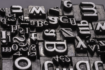 Typographical.
Different metal characters, it used to print documents