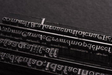 Typographical.
Different metal characters, it used to print documents