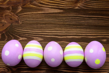 Easter eggs on wooden background