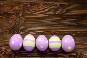 Easter eggs on wooden background