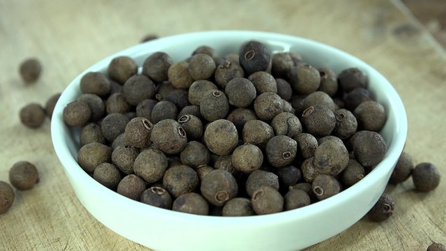 Some fresh made Allspice (rotating 4K footage; seamless loopable)