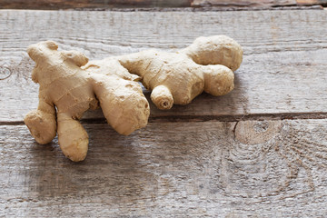 Ginger on wooden background