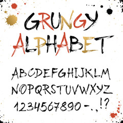 Hand drawn golden alphabet. Uppercase grunge letters and numbers isolated on white background. Handdrawn typography made with dry brush. Modern textured font.