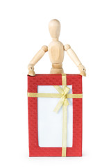 Man and the large gift box. Abstract image with a wooden puppet
