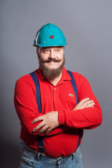 Cheerful builder in helmet