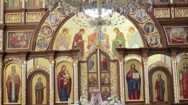 Catholic Church indoors/Modern Catholic church from the middle of many images of saints
