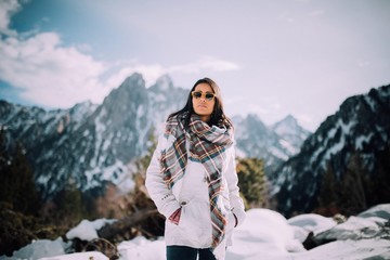 Casual Woman in a Winter Scenery