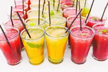 Fresh citrus juices or cocktails on the table
