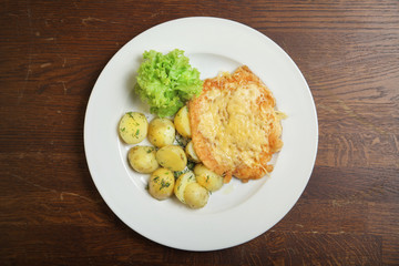 Fried potatoes with meat&cheese