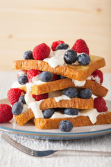 french toasts with creme fraiche and berries for breakfast