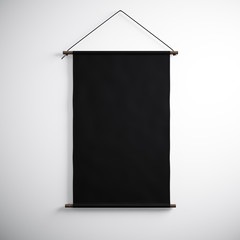 Photo of blank black canvas hanging on the white background. Vertical canvas. 3d render