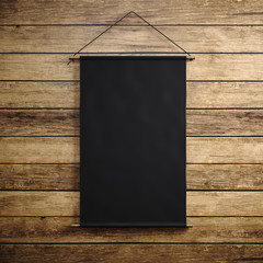Photo of blank black vintage canvas hanging on the wood background. Vertical mockup. 3d render