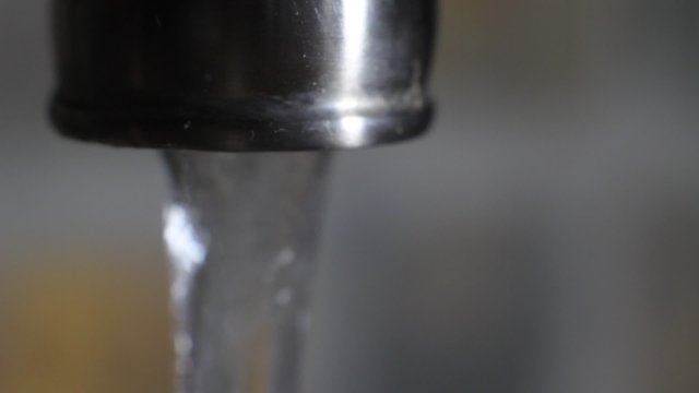 Tap Water Running Out Of A Faucet