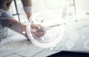 Businessman using smartphone.  Worldwide connection technology. Digital interface. Blurred,...