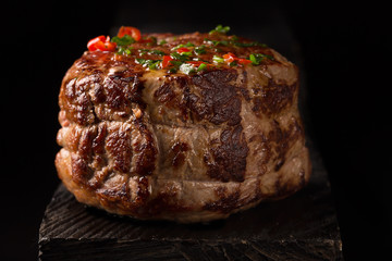 Grilled Steak Meat on the wooden surface