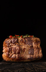 Grilled Steak Meat on the wooden surface