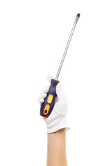 A screwdriver in the hand, isolated