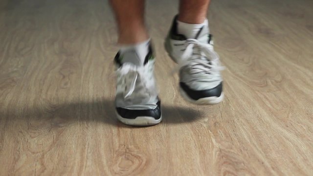 Man Jumps On A Skipping Rope.