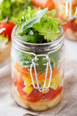 breakfast food on the bed inside a bedroom
