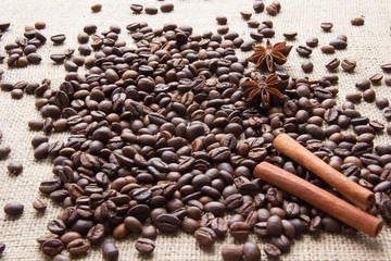 Grains of roasted coffee, cinnamon and star anise