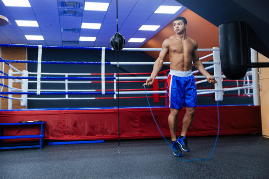 Boxer jumping with skipping rope