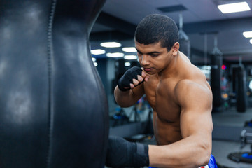Fototapeta na wymiar Boxer workout in gym