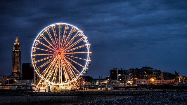 Big wheel in de evening in the city of Le Havre in France