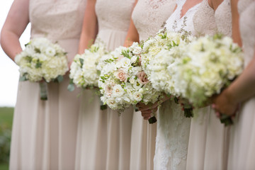 white simple bride wedding bouquet by tree