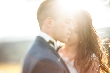 Fototapeta premium elegant stylish happy brunette bride and gorgeous groom on the