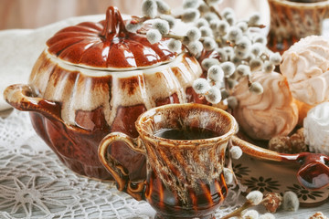 cups of coffee with a pussy willow, candies and a zephyr