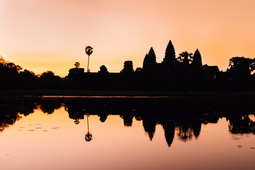 Fototapeta na wymiar Sunrise in Angkor Wat, a temple complex in Cambodia. UNESCO World Heritage Site.