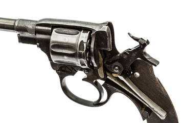 Disassembled revolver, pistol mechanism with the hammer cocked,