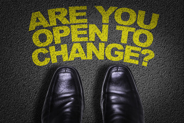 Top View of Business Shoes on the floor with the text: Are You Open to Change?