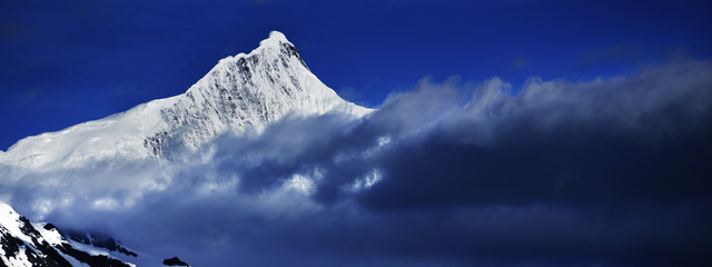 snowcap in cloud and mist
