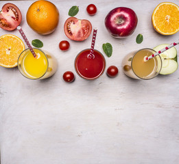 variety of fruits and vegetables, ingredients for fresh juice glasses with straws border ,with text area on wooden rustic background top view close up