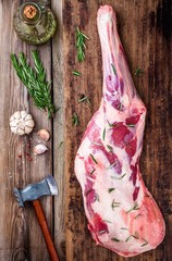 raw whole leg of lamb with spices